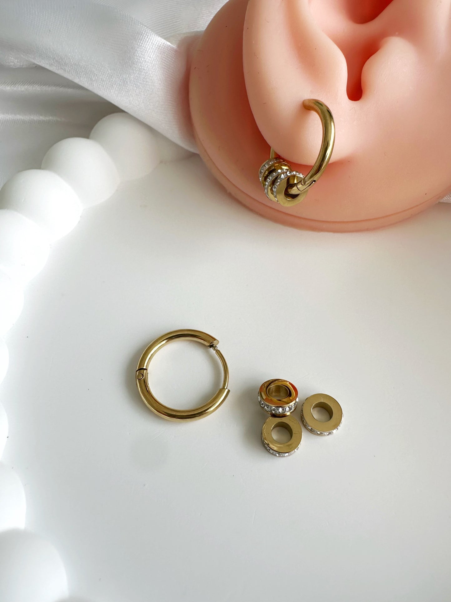 Charm Ohrring