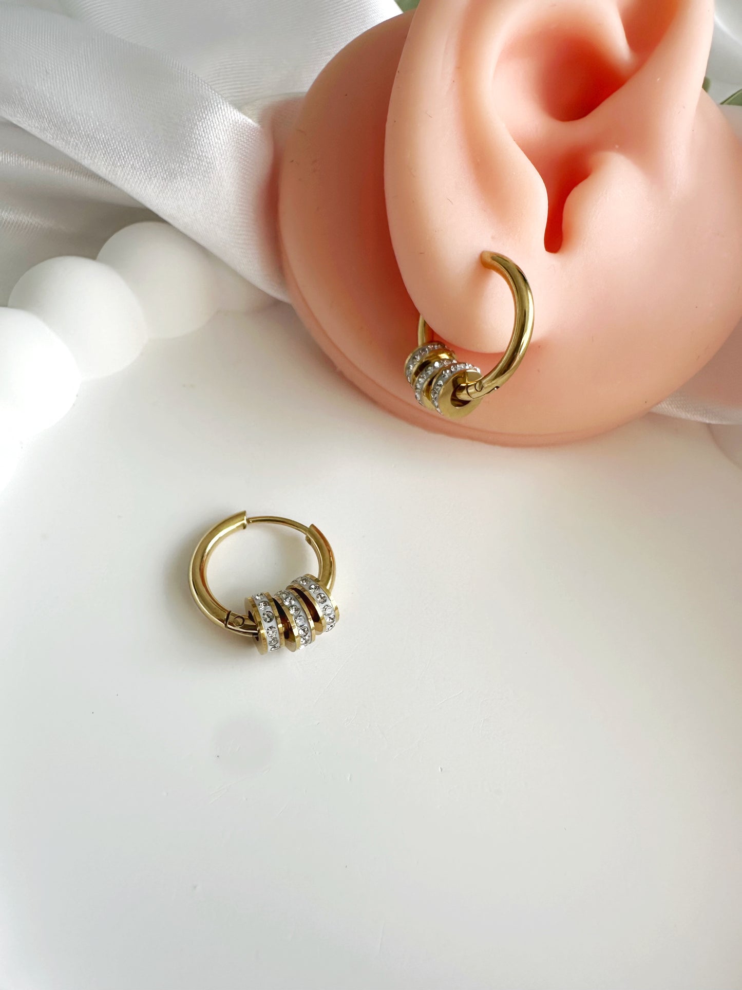 Charm Ohrring