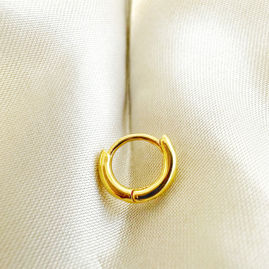 Creolen Piercing